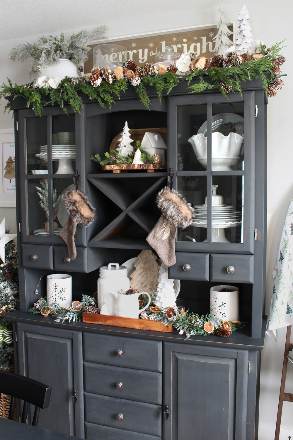 Painted black buffet and hutch decorated for Christmas.