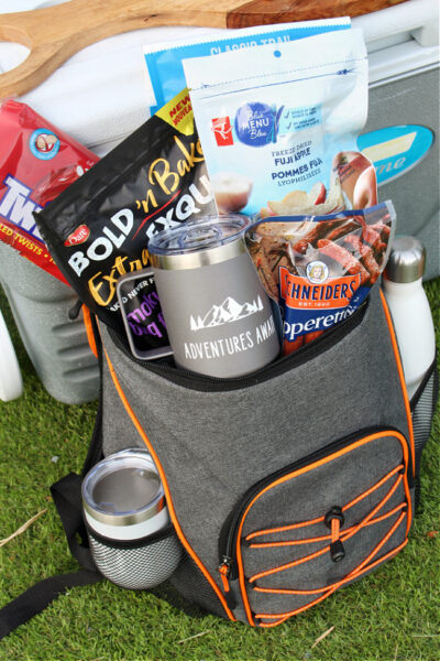 Personalized ice cooler camping gift basket.