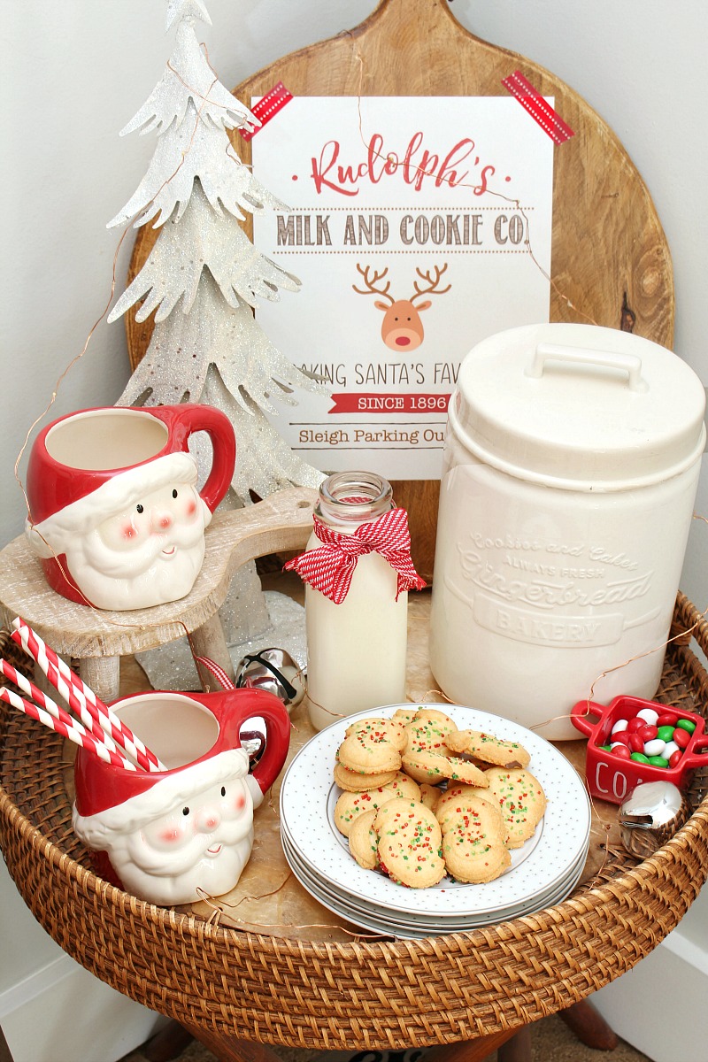 Christmas milk and cookie bar wth Santa mugs and cute Rudolph's Milk and Cookie Co. free Christmas printable.
