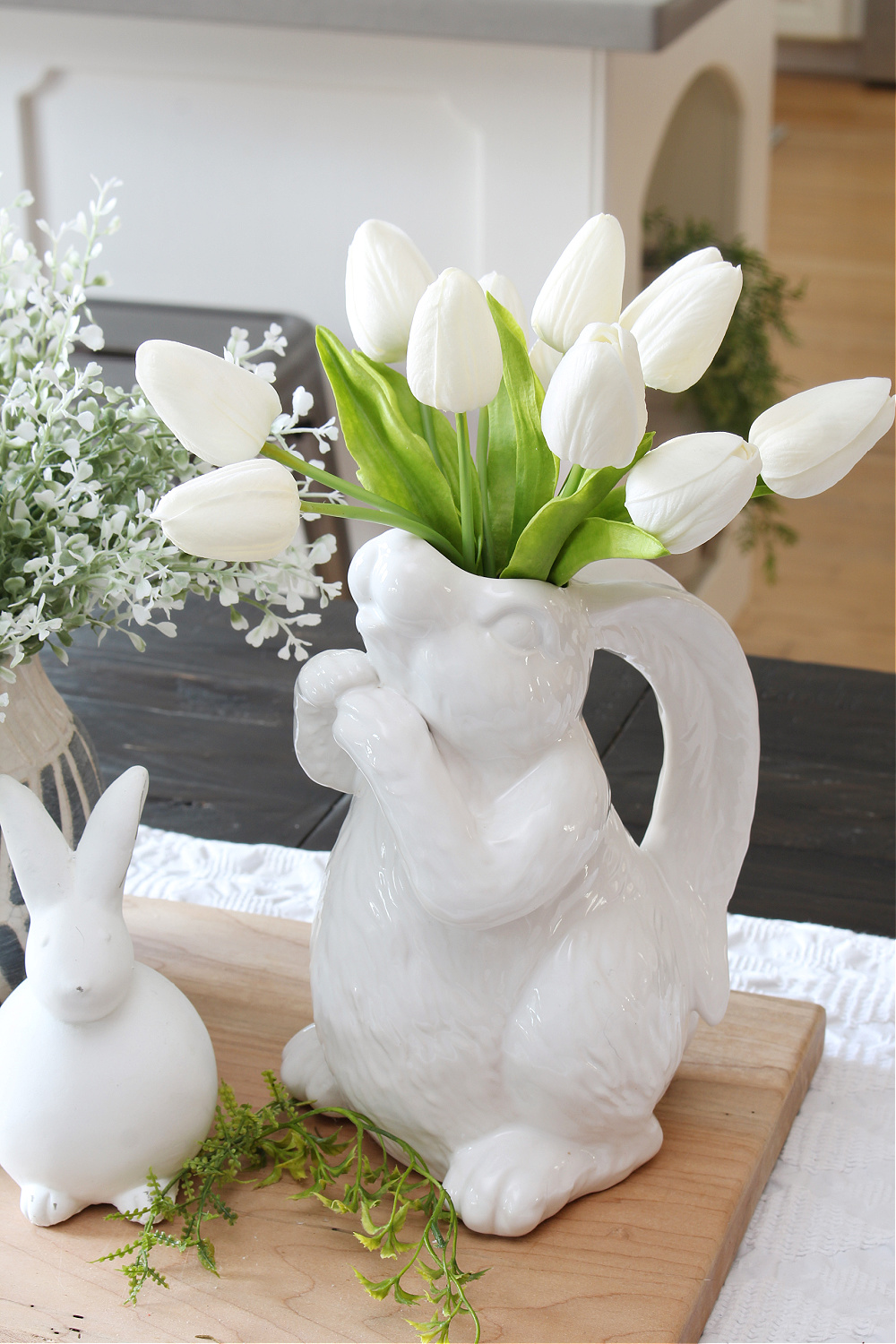Bunny vase with faux tulips.